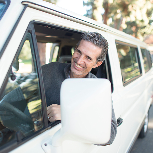 friendly chauffeur smiling